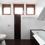 Komlo - *